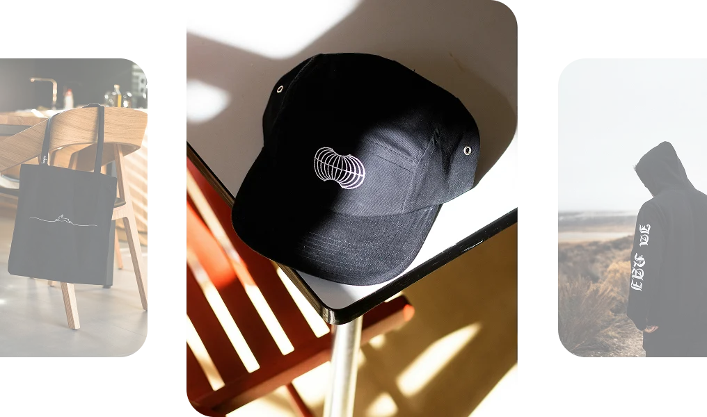 Collection of branded merchandise including a cap, bag, and clothing
